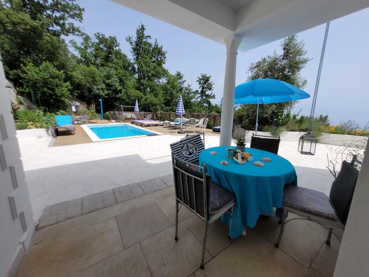 Ferienwohnung mit beheiztem Pool Kroatien Herbst und Winter Lovran Exterior foto